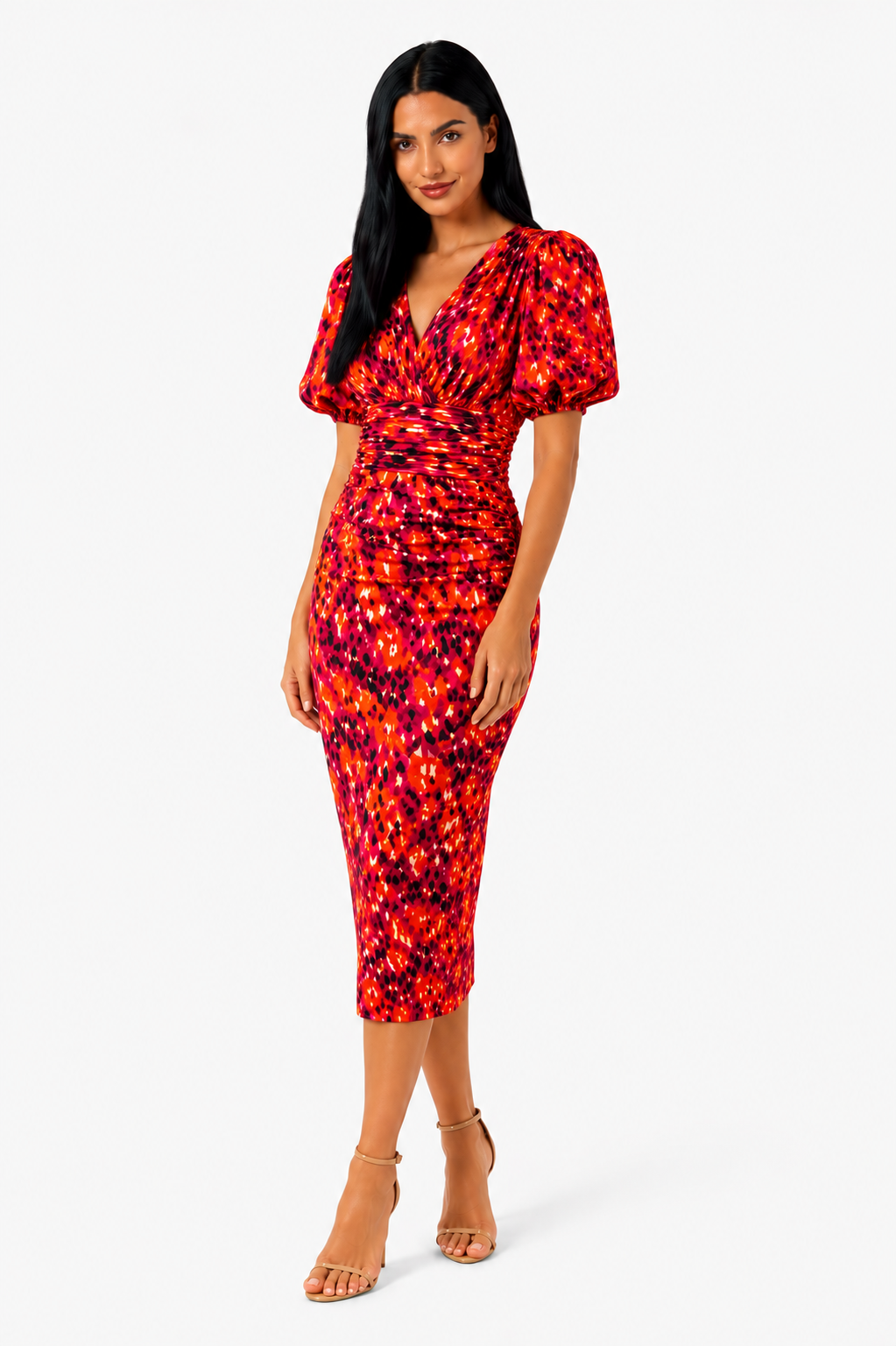 Vestido midi estampado con mangas abullonadas de la marca Vera Serrat, mostrando el diseño y los detalles del vestido en la imagen.