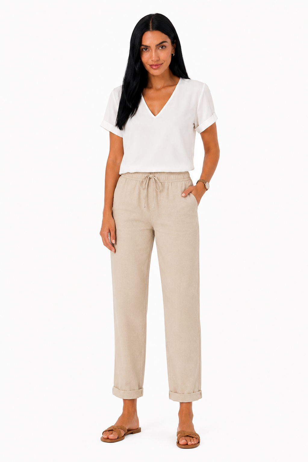 Pantalón fluido con cintura elástica de la marca Vera Serrat, en color oscuro, con diseño cómodo y moderno.