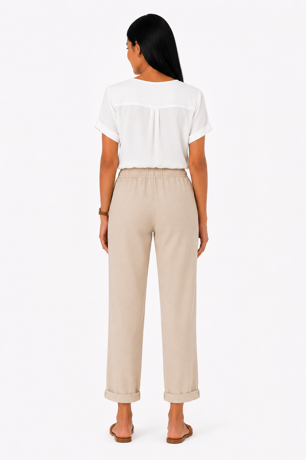 Pantalón fluido con cinturilla elástica de la marca Vera Serrat, en color neutro, con diseño cómodo y moderno.
