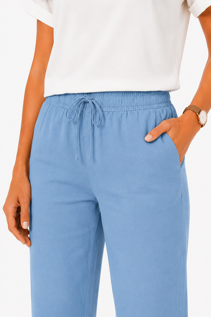 Pantalón fluido con cintura elástica de Vera Serrat, en color negro, con diseño cómodo y moderno para mujer.