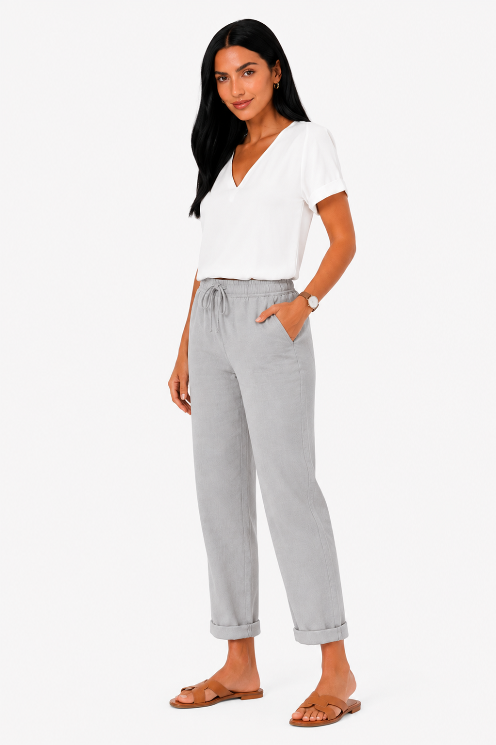Pantalón fluido con cinturilla elástica de la marca Vera Serrat, en color oscuro y tejido ligero, mostrado en posición de pie.