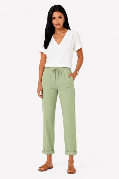Pantalón fluido con cintura elástica de Vera Serrat, en color neutro, mostrando su diseño cómodo y elegante para mujer.