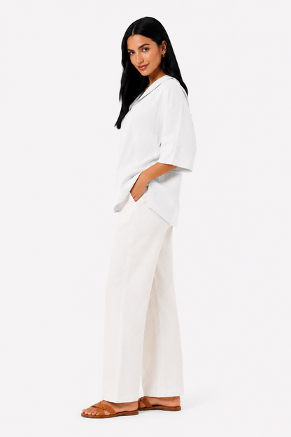 Blusa blanca de corte fluido de la marca Vera Serrat, con estilo elegante y diseño cómodo para uso diario.