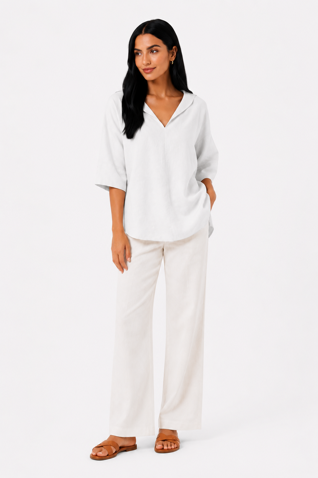 Blusa blanca de corte fluido de la marca Vera Serrat, con diseño elegante y cómodo para looks casual y formales.