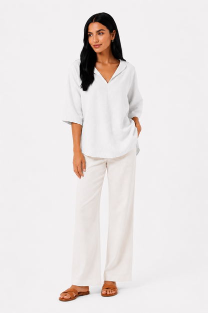 Blusa blanca de corte fluido de la marca Vera Serrat, con diseño elegante y cómodo para looks casual y formales.