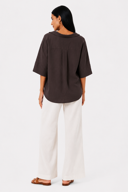 Blusa blanca de corte fluido de la marca Vera Serrat, con diseño elegante y tejido suave.
