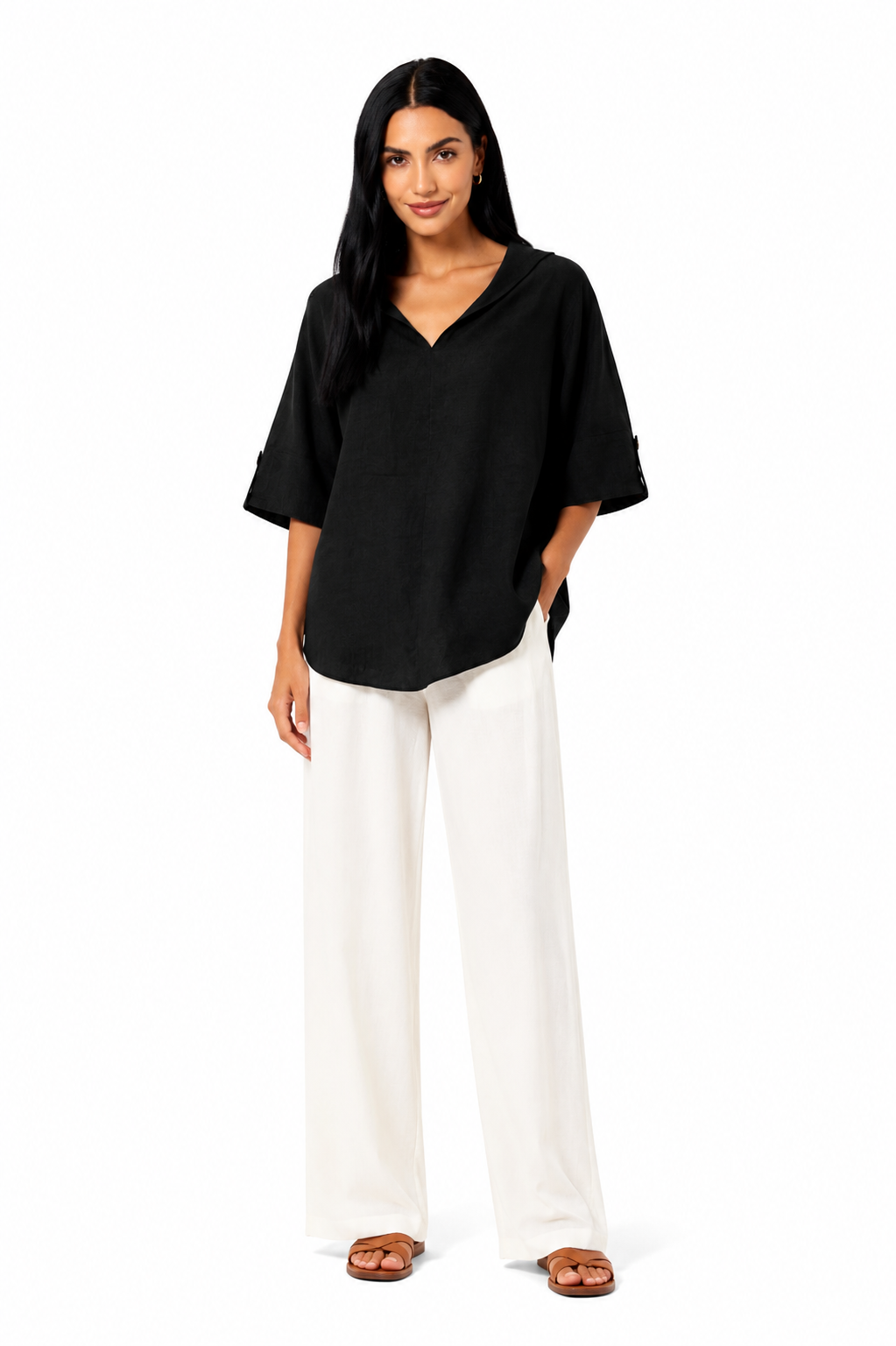 Blusa blanca de corte fluido de la marca Vera Serrat, con diseño elegante y tejido suave.