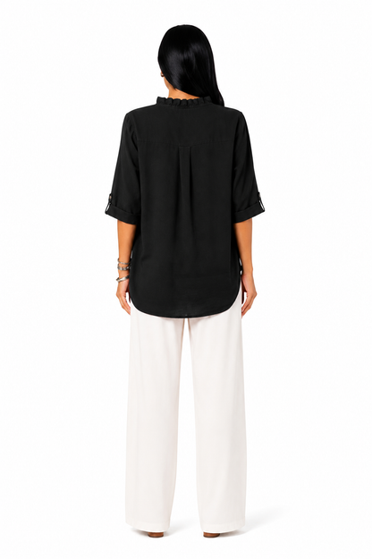 Camisa de algodón y lino con volantes de la marca Vera Serrat, en color blanco y diseño fresco y elegante.