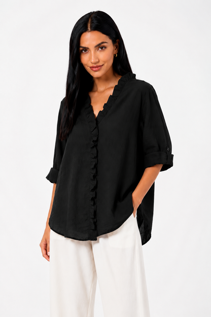 Camisa de algodón y lino con volantes de la marca Vera Serrat, en color blanco, con detalles elegantes y femeninos.