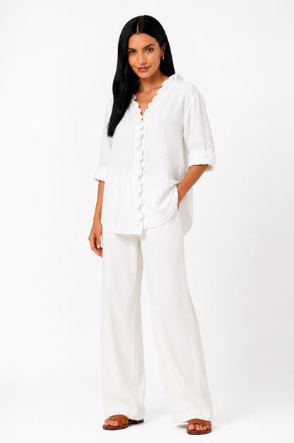 Camisa de algodón y lino con volantes de la marca Vera Serrat, en color blanco con detalles delicados y estilo femenino.