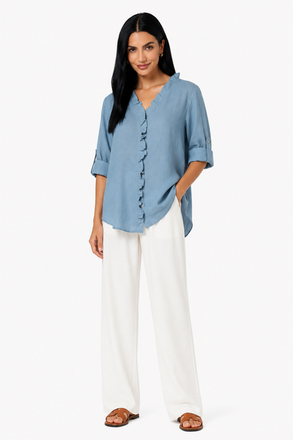 Camisa de algodón y lino con volantes de la marca Vera Serrat, en color blanco, con detalles femeninos y estilo casual elegante.