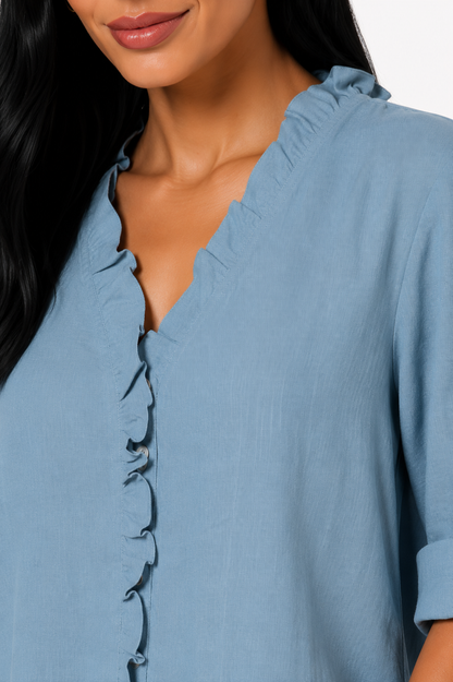 Camisa de algodón y lino con volantes de la marca Vera Serrat, en color blanco, con detalles elegantes y estilo femenino.