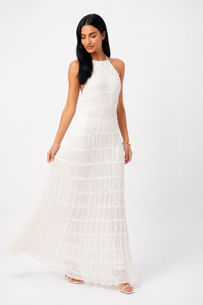 Vestido largo de verano Ángela de NOA FERRER, con elegantes detalles y tejido ligero, diseñado para lucir en temporadas cálidas.