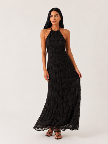 Vestido largo de verano Ángela de la marca NOA FERRER, con diseño elegante y aire fresco, en colores claros y tejidos ligeros.
