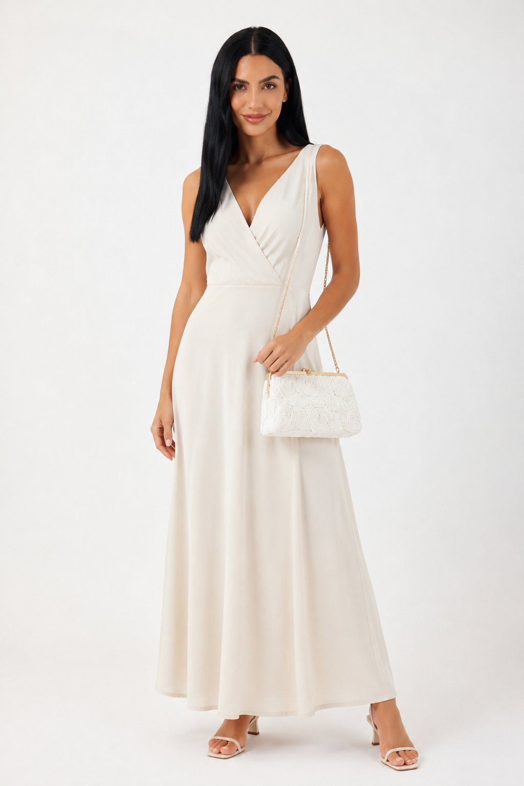 Bolso de mano elegante Flora de Vera Serrat, con diseño sofisticado y detalles en cuero para ocasiones especiales.