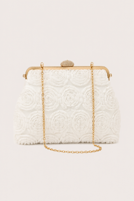 Bolso de mano elegante Flora de Vera Serrat, con diseño sofisticado y detalles en cuero y acabado refinado.