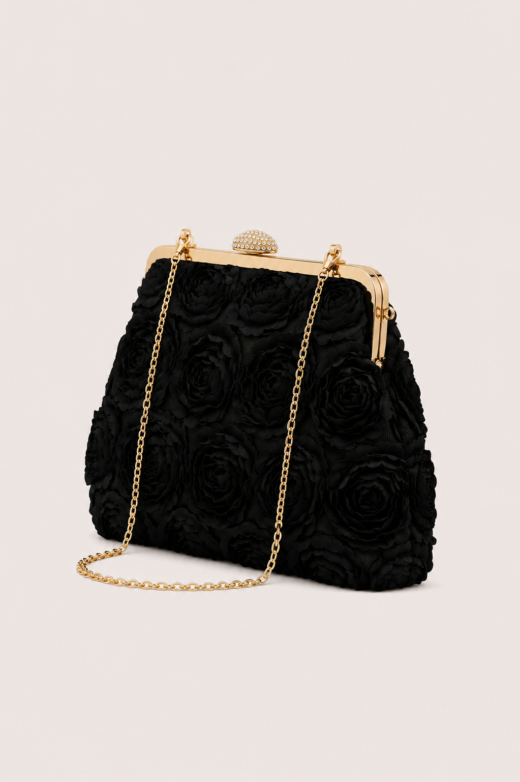 Bolso de mano elegante Vera Serrat Flora, diseño sofisticado y compacto, con detalles en tonos neutros.