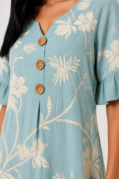 Vestido Serena de Vera Serrat, vestido femenino con diseño elegante y detalles en la parte superior, en tonos suaves.