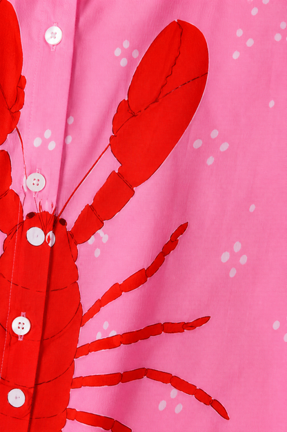 Conjunto colorido Riviera Lobster de Aurevia Málaga, con camiseta y pantalones en tonos vibrantes, diseñado para un estilo moderno y cómodo.