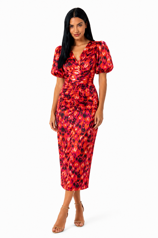 Vestido midi estampado con mangas abullonadas de Vera Serrat, diseño femenino y moderno, ideal para ocasiones especiales.