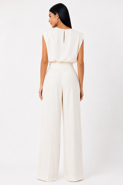 Mono con cintura definida Valeria de Renata Mexico, vestido elegante de tela lisa y ajuste ceñido en la cintura, para ocasiones especiales.