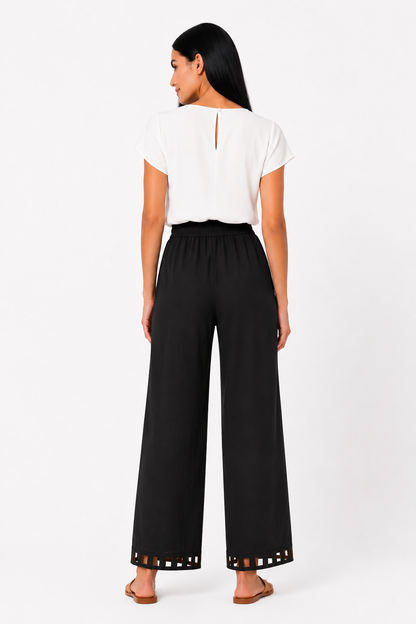 Pantalón de lino chic para mujer de la marca Vera Serrat, en color beige, con diseño elegante y cómodo.