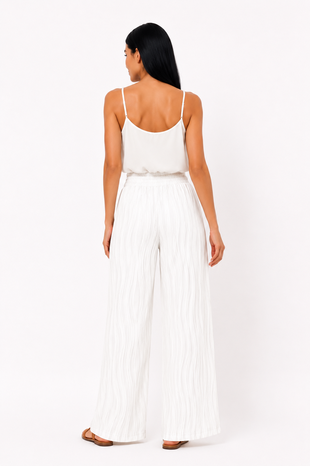 Pantalón de cintura alta Emma de Vera Serrat, en color negro, con diseño ajustado y detalles elegantes para mujer.