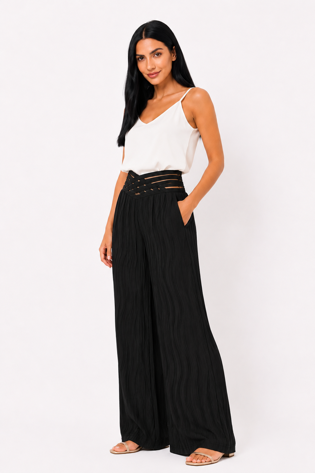 Pantalón de cintura alta Emma de Vera Serrat, en color negro, con ajuste ceñido y estilo elegante, visible en la imagen.