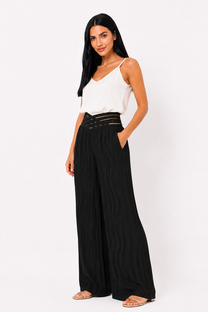 Pantalón de cintura alta Emma de Vera Serrat, en color negro, con ajuste ceñido y estilo elegante, visible en la imagen.