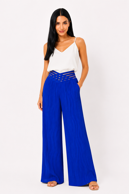 Pantalón de cintura alta Emma de Vera Serrat, en color negro, con detalle de cinturilla y ajuste en la cintura.