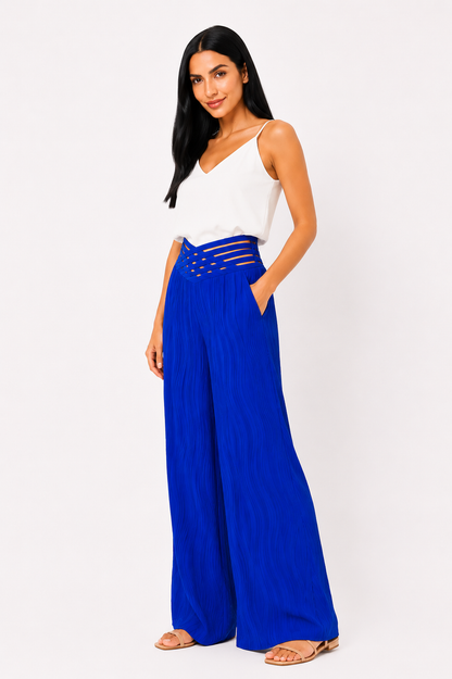 Pantalón de cintura alta Emma de Vera Serrat, en color negro, con diseño ajustado y acabado elegante, visible en la imagen