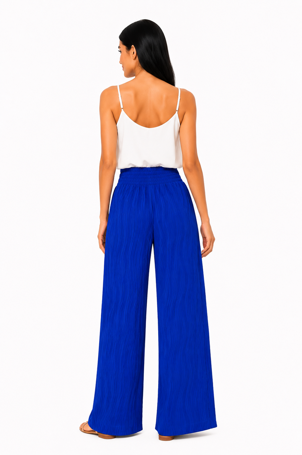 Pantalón de cintura alta Emma de Vera Serrat, en color negro, con diseño ajustado y tela suave, visible en la imagen.