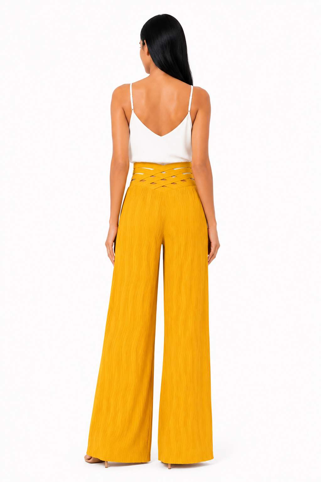 Pantalón de cintura alta Emma de Vera Serrat, en color negro, con diseño ajustado y detalles de costura en la parte frontal.