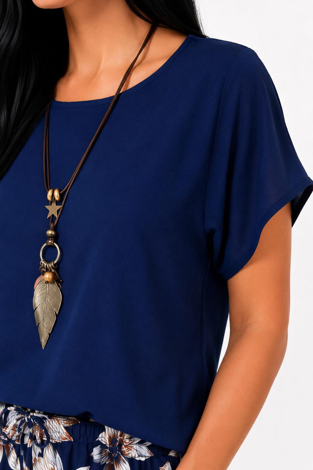 Conjunto floral de dos piezas con pantalón de pierna ancha de la marca Vera Serrat, ropa casual y elegante para mujer.