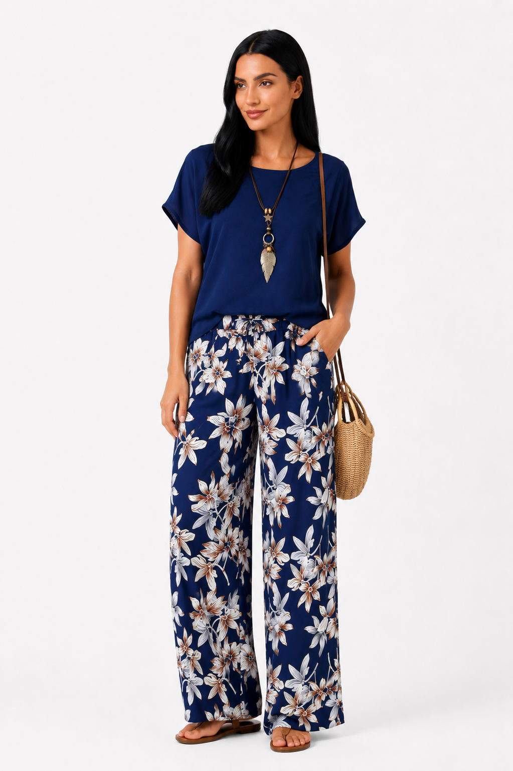 Conjunto floral de dos piezas Daniela de Vera Serrat, blusa y pantalón de pierna ancha, con estampado colorido y estilo elegante.