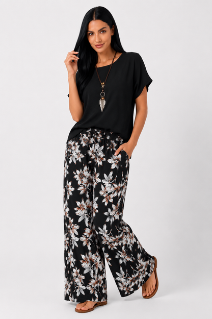 Conjunto floral de dos piezas Daniela de Vera Serrat con pantalón de pierna ancha, ropa de moda para mujer.