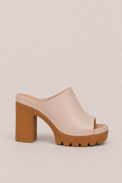 Sandalias de plataforma Vera Serrat Mireya con tacón ancho y diseño moderno, vistas desde el lado mostrando la suela y correa.