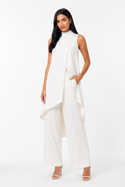 Vestido de dos piezas elegante y asimétrico de Vera Serrat, con diseño moderno y detalles sofisticados.