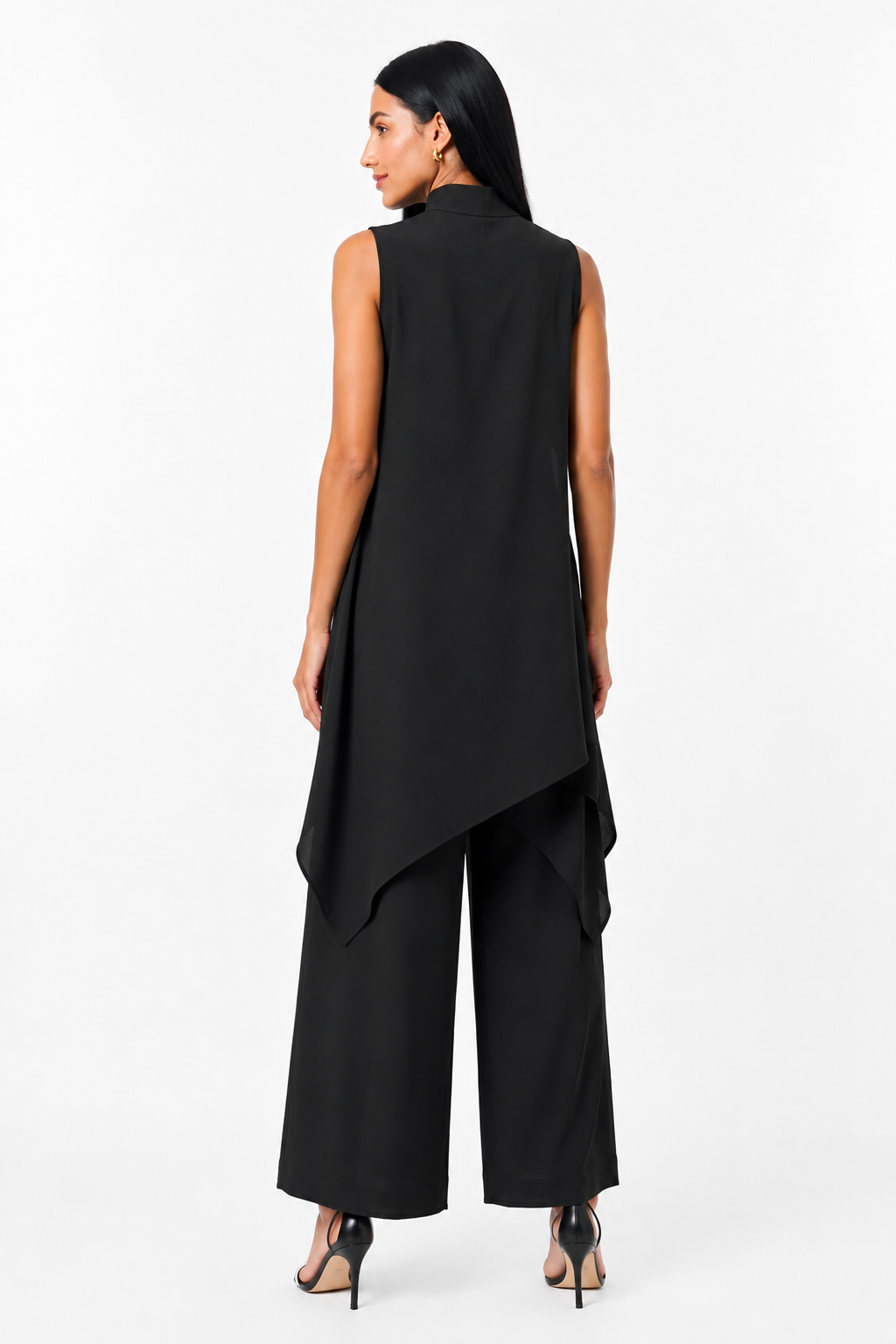 Vestido de dos piezas asimétrico y elegante de la marca Vera Serrat, con diseño moderno y detalles sofisticados.