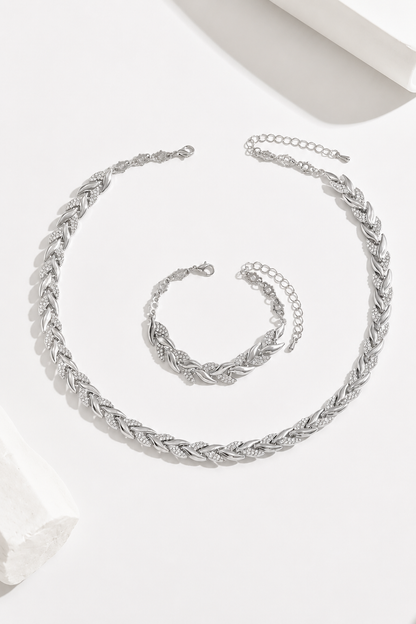 Conjunto de collar y pulsera de espiga Vera Serrat, accesorios de joyería en oro con diseño elegante y moderno.