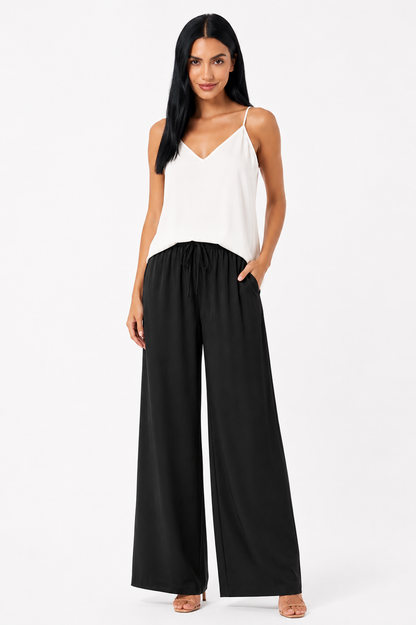 Pantalón Alba de Vera Serrat, con estilo ligero y elegante, ideal para uso diario, en color neutro y tejido suave.