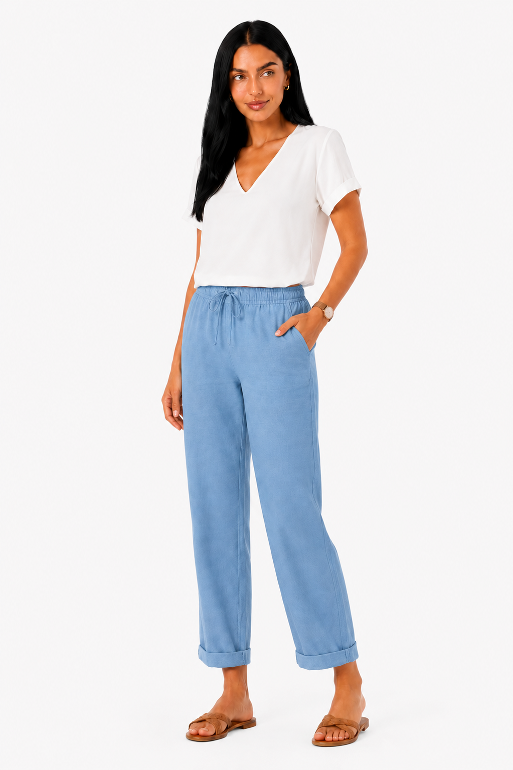 Pantalón fluido de Vera Serrat con cintura elástica, en color neutro, mostrando un ajuste cómodo y estilo elegante.