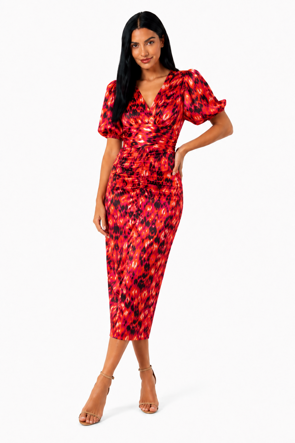 Vestido midi estampado de Vera Serrat con mangas abullonadas, diseño elegante y moderno para ocasiones especiales.