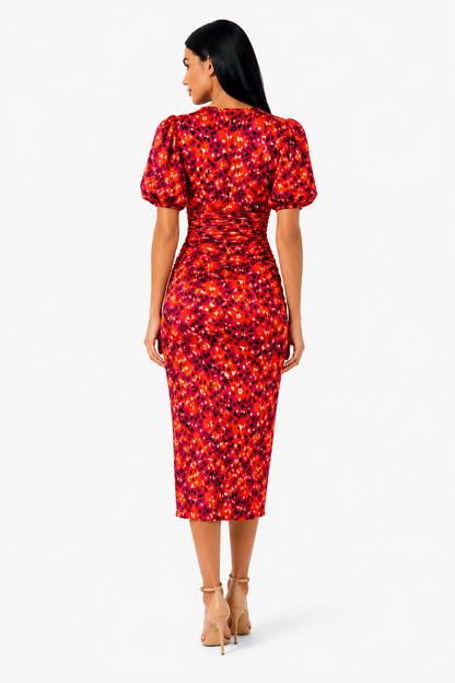 Vestido midi estampado con mangas abullonadas de Vera Serrat, diseño elegante y moderno para ocasiones especiales.