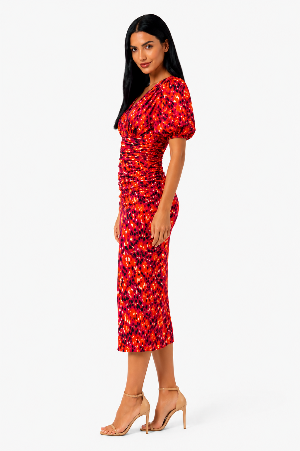 Vestido midi estampado con mangas abullonadas de Vera Serrat, muestra el diseño elegante y colorido del vestido en la imagen.
