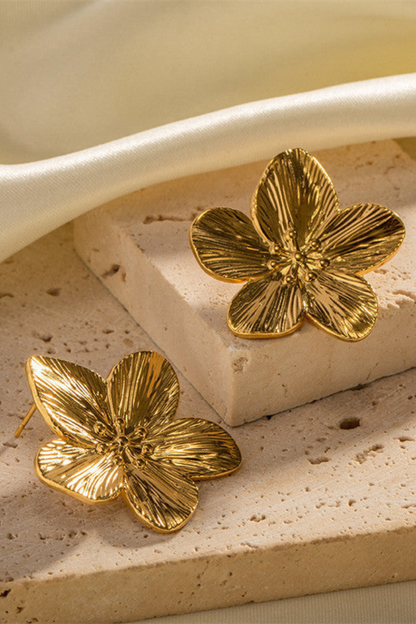 Pendientes flor brillantes de Vera Serrat con diseño delicado y detalles relucientes para un estilo elegante y natural.