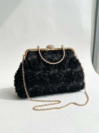Bolso de mano elegante NOA FERRER Flora, diseño sofisticado y moderno en color neutro, con detalles finos y acabado de alta calidad.