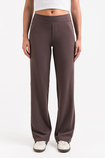 Pantalón elástico de tiro medio MADLADY, pantalones cómodos y ajustados, en color negro, vista frontal.