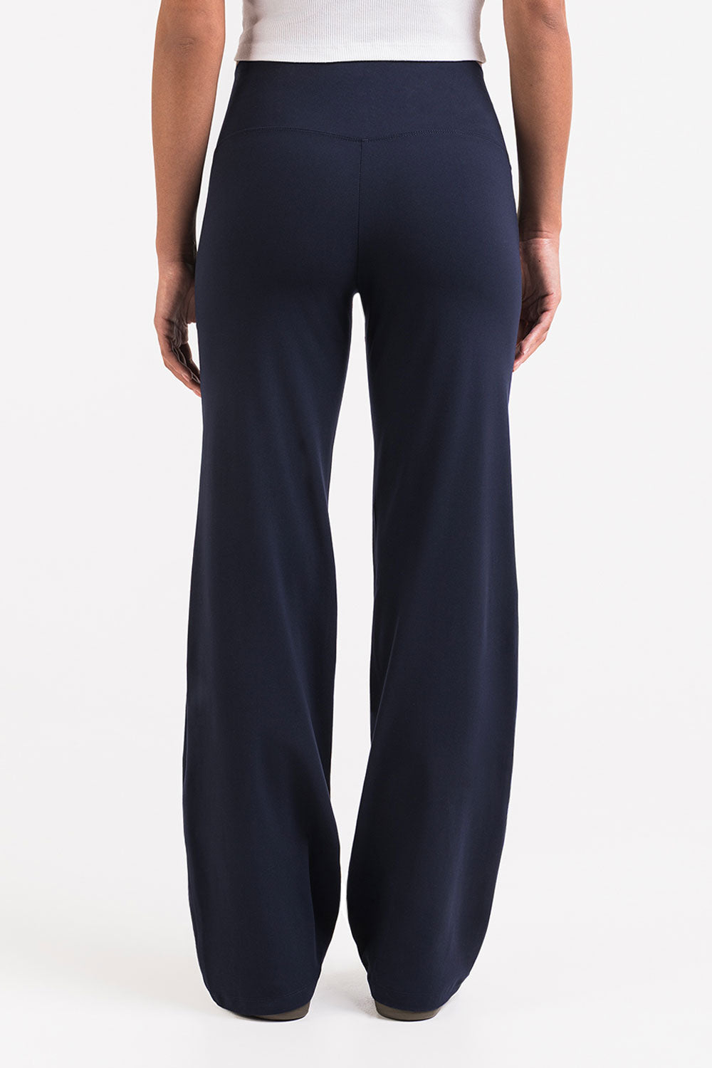 Pantalón elástico de tiro medio negro de MADLADY, pantalones ajustados con cintura cómoda y diseño moderno.