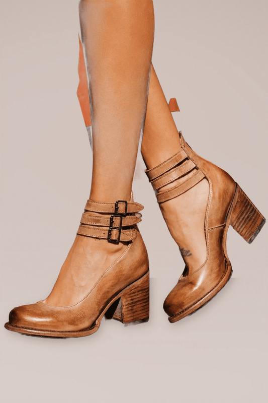 Sandalias elegantes Elena de Van Laarhoven Mode con tacón vintage, en color neutro y diseño clásico en la imagen.